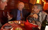 Dan Tana, center, shares a laugh with a couple of his patrons at his restaurant, Dan Tana's, Tuesday - (Image via Getty)